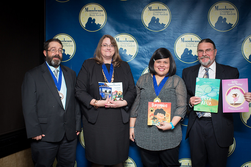 Spanish Language Category Medalists: Scott Osborne, Yvonne Osborne, and Anya Damirón with Jim Barnes
